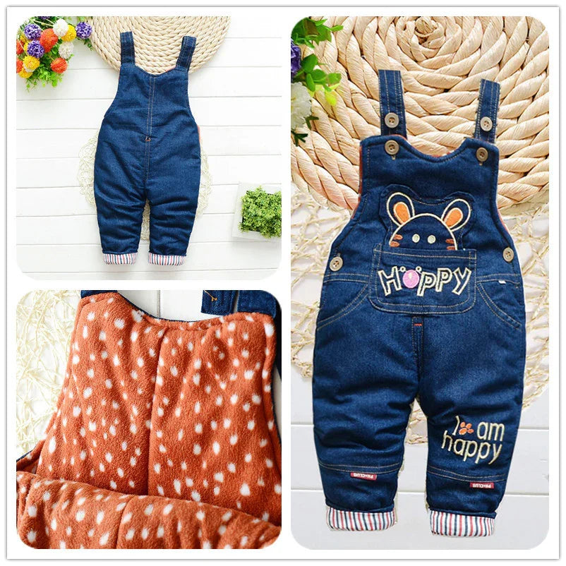 Cute blue denim baby overalls with cartoon bear, striped cuffs, fleece lining, and embroidered text.