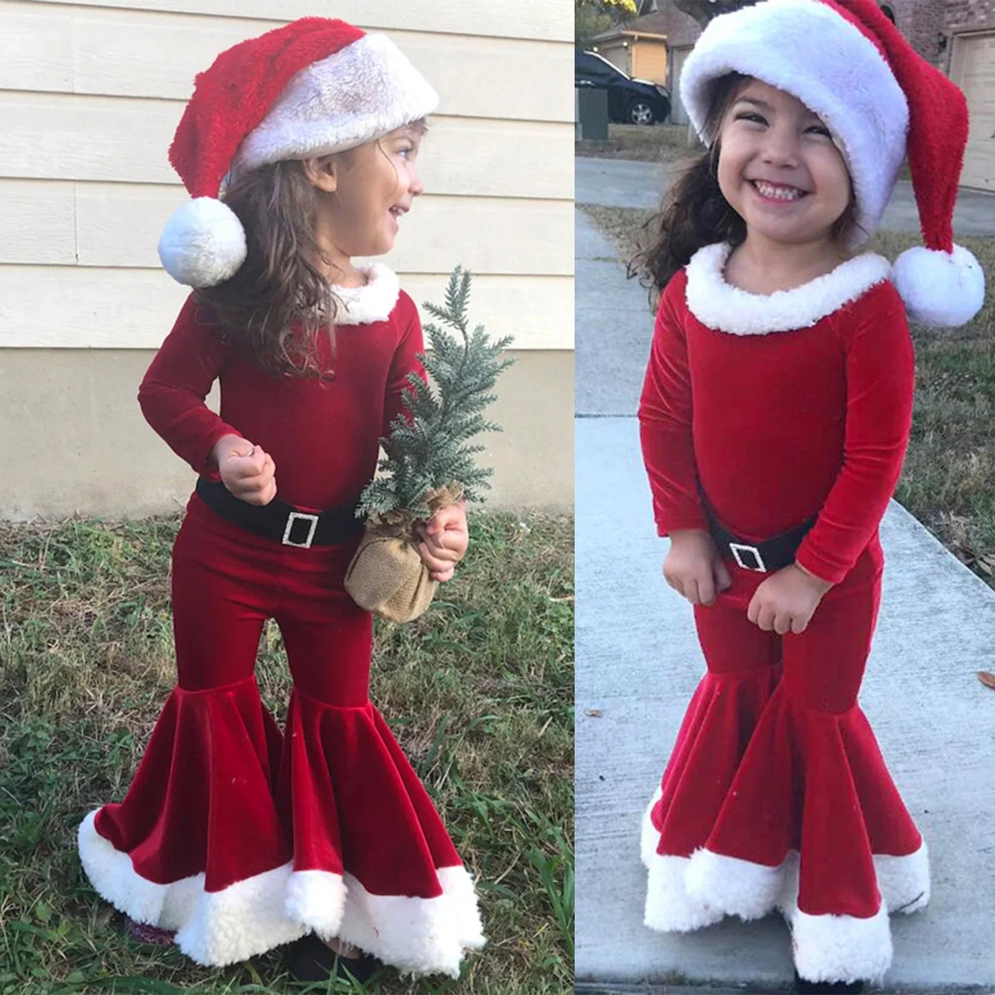 Smiling girl in red Santa outfit, flared pants, Santa hat, holding mini Christmas tree outdoors