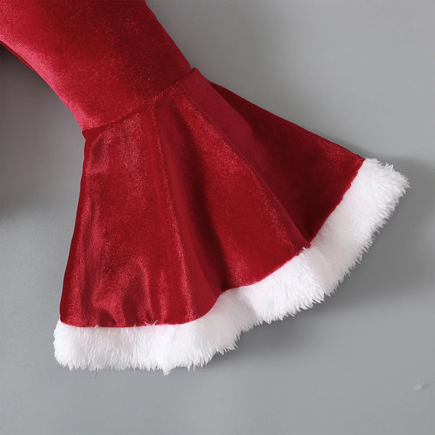 Red velvet bell sleeve with white faux fur trim, Christmas costume detail